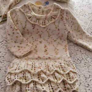 knitting pattern for a baby girls pixie style dress/bodysuit