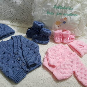 Premature to 6 month knitting pattern for a lacy cardigan set