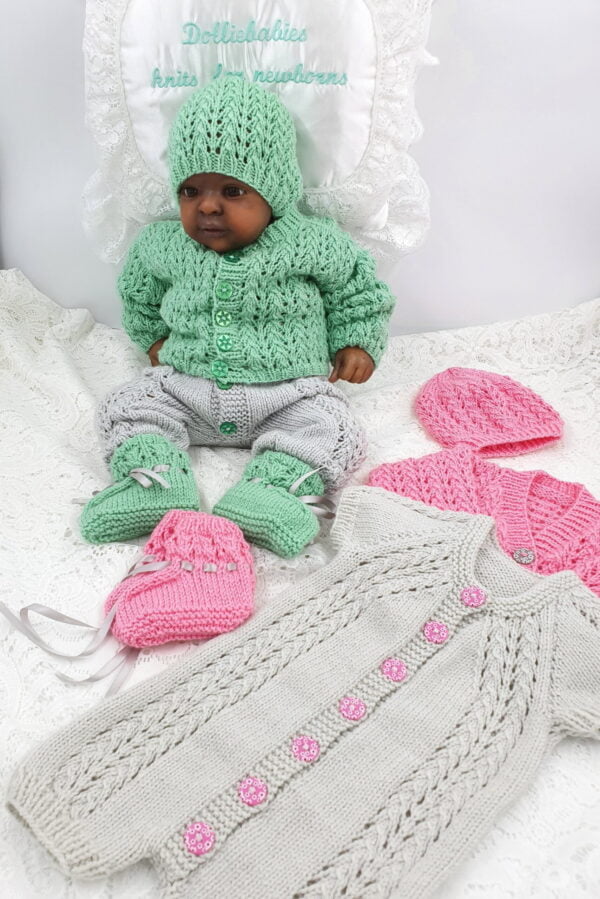 Knitting pattern for a onesie set with cardigan for newborn to 9 month babies