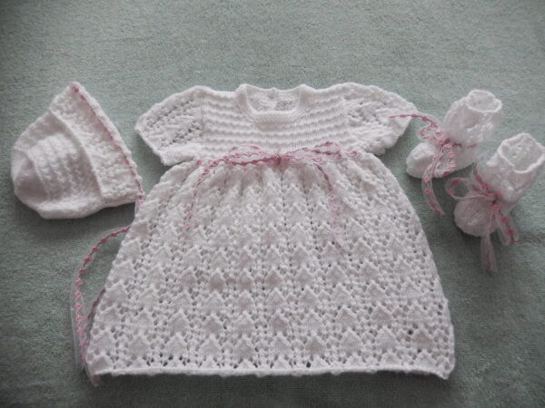 reborn or baby knitting pattern for a lacy dress
