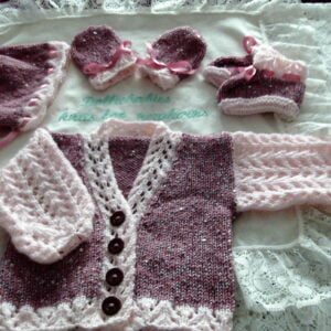 Lace sleeve and border baby cardigan knitting pattern